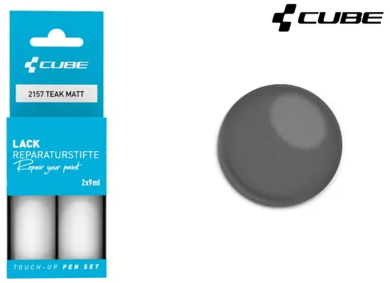 Zwei CUBE Lackstift Set TEAK matt 2157 in blauer Verpackung, mit grauem Farbmuster und CUBE Logo oben rechts - erhältlich bei Mr. Bike Lichtenfels.
